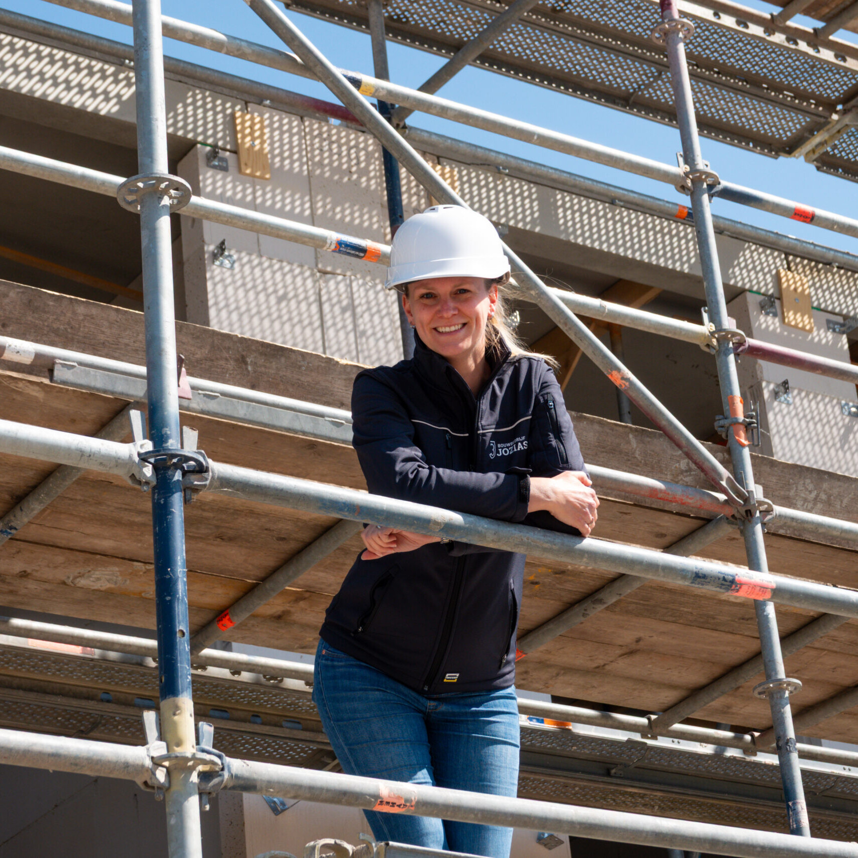 Kopersbegeleider op bouwplaats